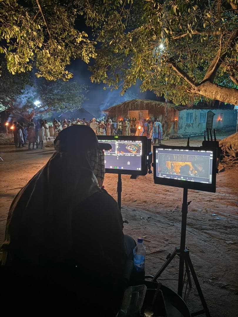 Director reviewing a take